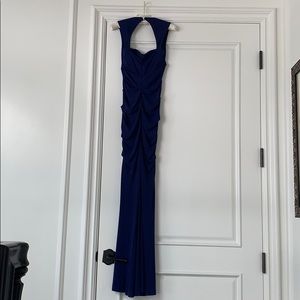 A long  Nicole Miller evening gown .